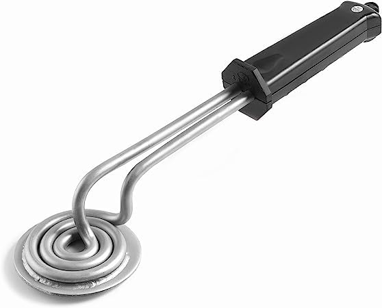 Le fer electrique a carameliser chauffe une plaque circulaire